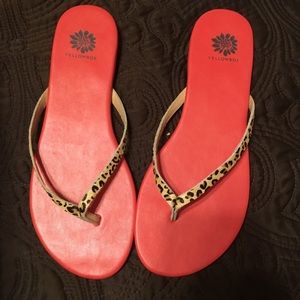 Yellow box flip flops